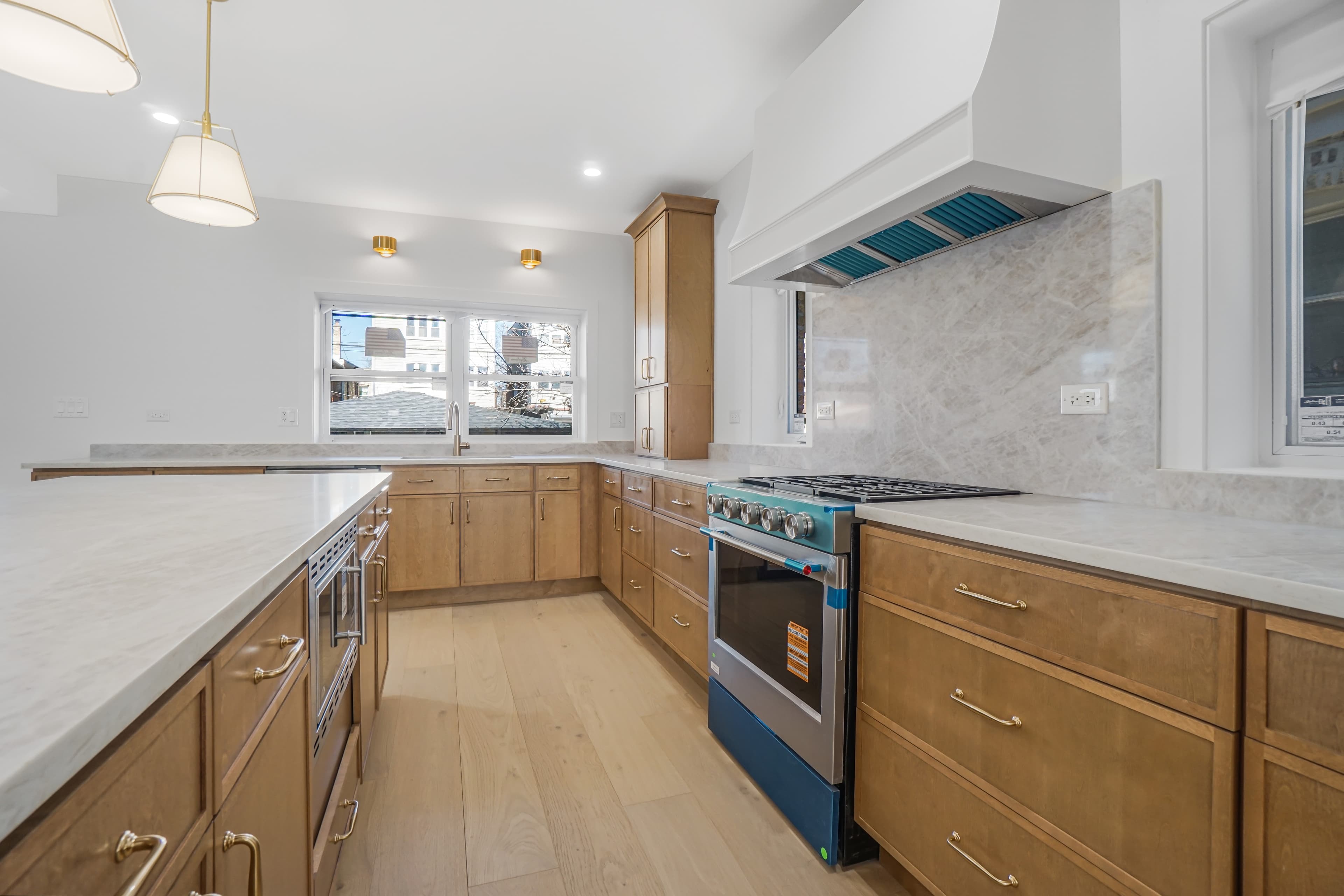 Another angle of the renovated kitchen island and cabinetry